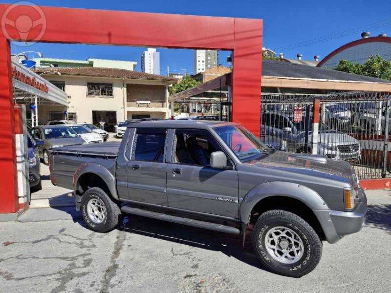 MITSUBISHI - L200 2.5 GLS HPE 4X4 CD 8V TURBO DIESEL 4P MANUAL - 2002/2003 - CINZA - R$ 59.000,00