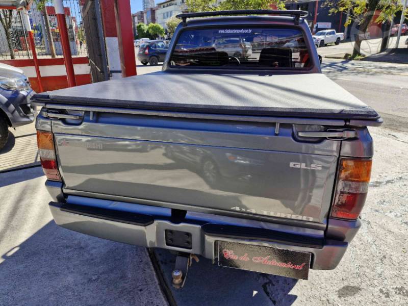 MITSUBISHI - L200 2.5 GLS HPE 4X4 CD 8V TURBO DIESEL 4P MANUAL - 2002/2003 - CINZA - R$ 54.900,00